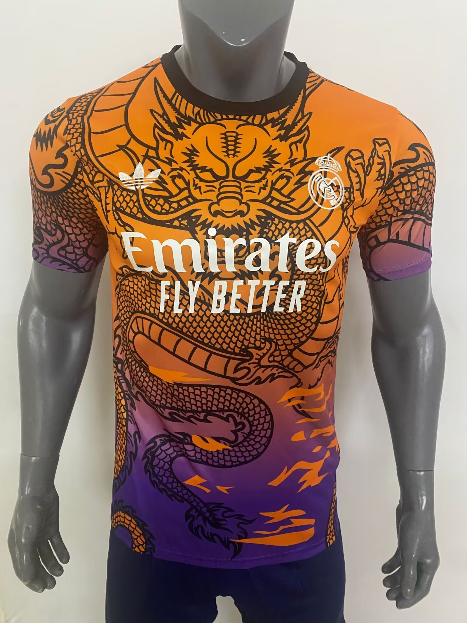 Herren Real Madrid Sonderausgabe Orange Dragon Jersey 2024/25