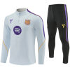 Mens Barcelona training suit with purple shoulder panels and black trousers front view