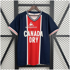 Mens PSG Retro Home Jersey 1974/75 on hanger showing navy body with central red Hechter stripe and Canada Dry sponsor