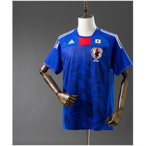 Mens World Cup Japan Retro Home Jersey 2010 on mannequin showing samurai blue base and red throat insert