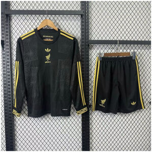 Kids Mexico black and gold special Long Sleeve Kit 2025 laid flat showing long sleeve shirt and black shorts