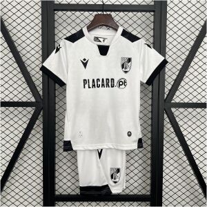 Kids Vitoria SC Home Kit 2025/26 on rack showing white embossed jersey with black accents and matching white shorts