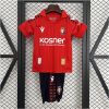Kids Osasuna Home Kit 2025/26 front view on display