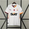 Mens Galata Away Jersey 2024/25 on display showing off-white body with wavy watermark graphics and split orange-maroon collar