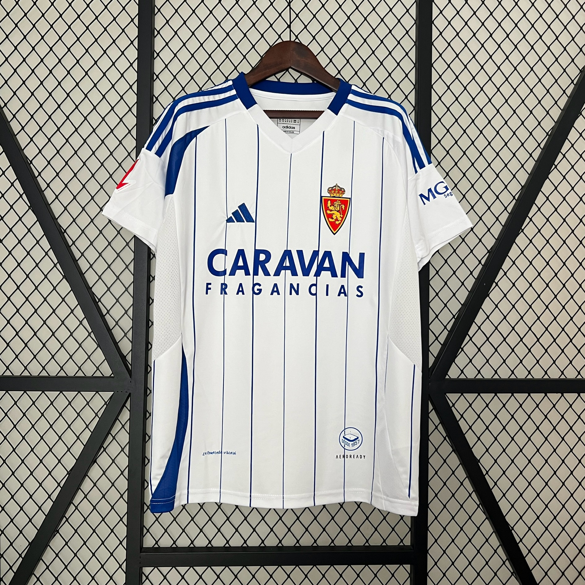 Mens Real Zaragoza Home Jersey 2024/25 Mens Real Zaragoza Home Jersey 2024/25 front view on display