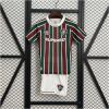 Kids Fluminense Home Kit 2025/26 front view on display