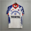 Mens PSG Retro Away Jersey 1993/94 on hanger showing white and blue spray graphics with Commodore and Tourtel sponsors