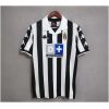 Mens Juventus Retro Home Jersey 1999/00 on hanger showing black and white vertical stripes