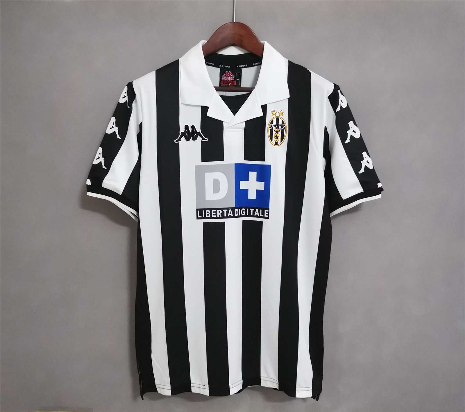 Mens Juventus Retro Home Jersey 1999/00 Mens Juventus Retro Home Jersey 1999/00 on hanger showing black and white vertical stripes