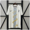 Mens Tottenham clothing Pre-Match Jersey 2025/26 on hanger showing white shirt with vertical dragon graphic column