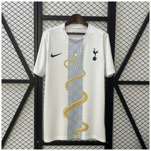 Mens Tottenham clothing Pre-Match Jersey 2025/26 on hanger showing white shirt with vertical dragon graphic column