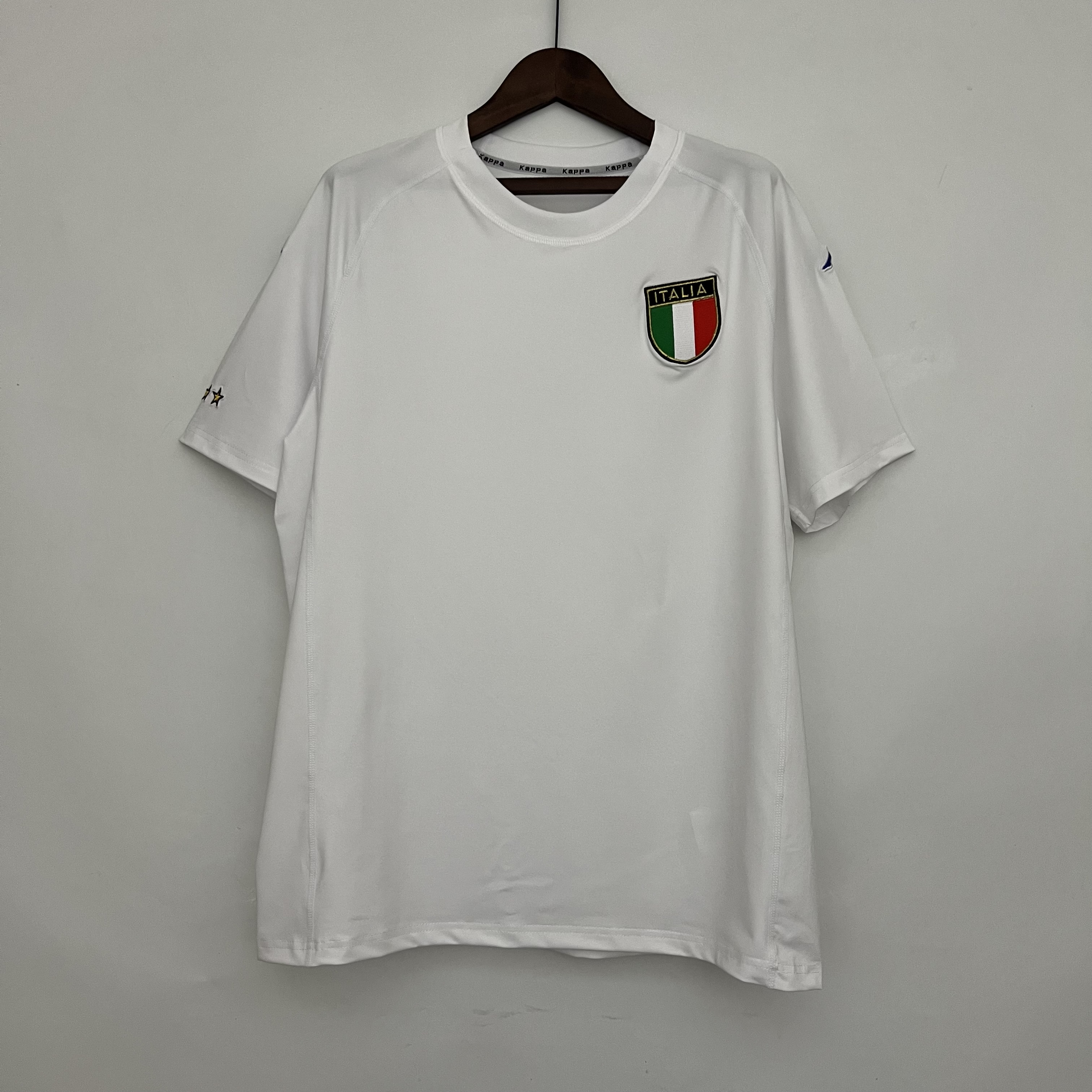 Mens Italy Retro Away Jersey 2000 Mens Italy Retro Away Jersey 2000 front view on hanger showing crew neck and circular ITALIA chest crest