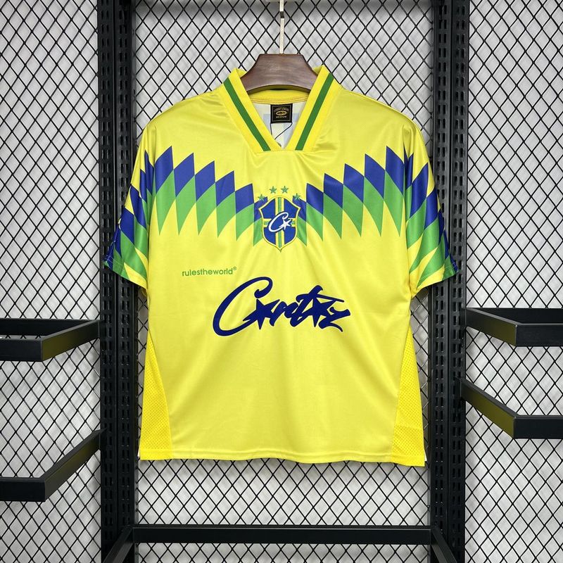 Mens Brazil Corteiz Retro Home Jersey 1995 Mens Brazil Corteiz Retro Home Jersey 1995 on hanger showing yellow body with blue and green chevron pattern