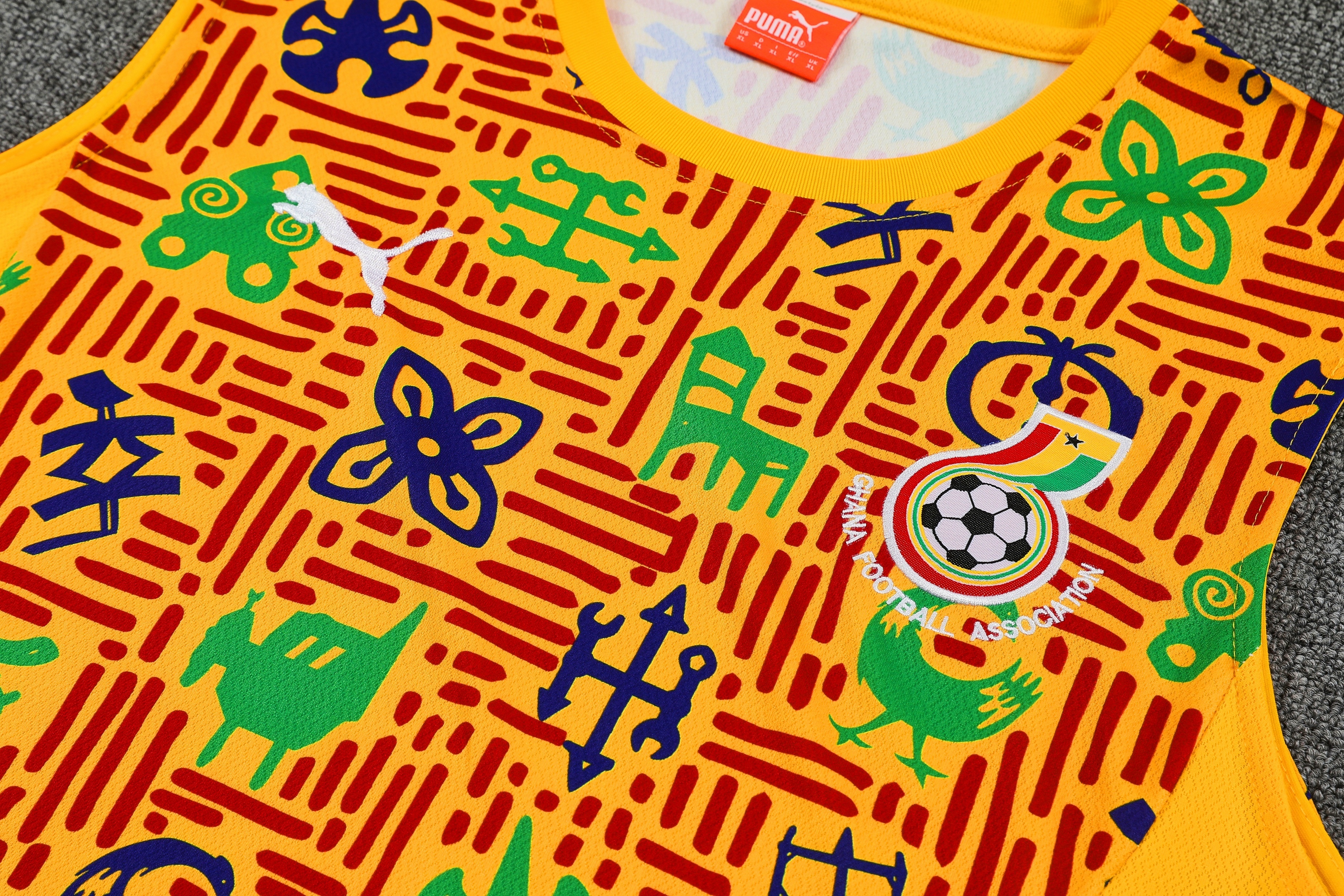 Mens Ghana Orange Training Kit 2025 Mens Ghana Orange Training Kit Singlet Kits Kit 2025 rear view of shirt and shorts