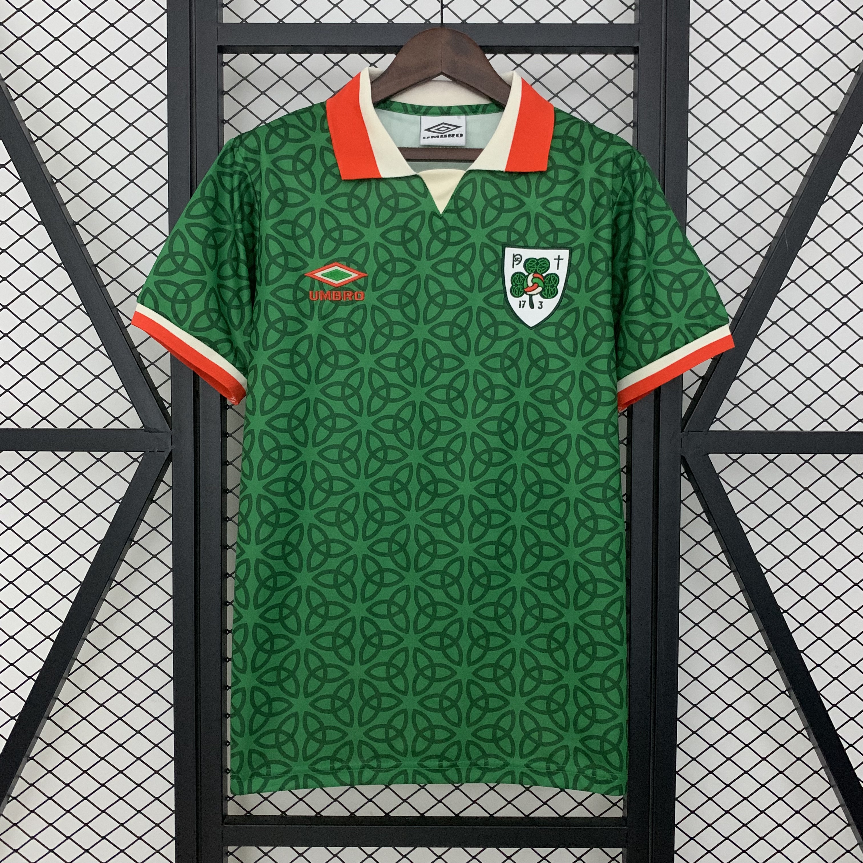 Mens Ireland St. Patrick Day Home Jersey 2025/26 Mens Ireland St. Patrick Day Home Jersey 2025/26 front view on hanger showing Celtic knot print and shield crest