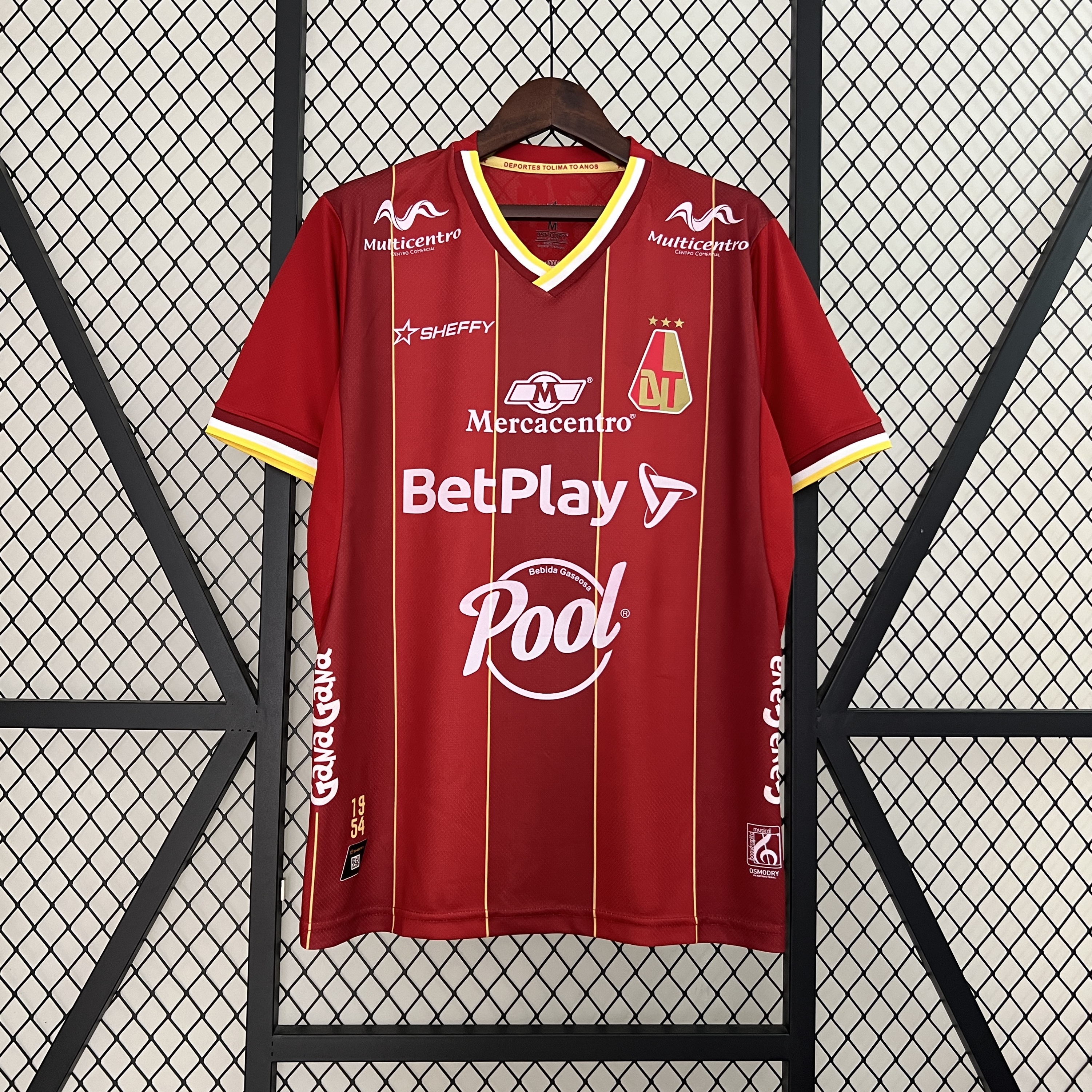 Mens Tolima Home Jersey 2024/25 Mens Tolima Home Jersey 2024/25 front view showing maroon shirt with yellow pinstripes