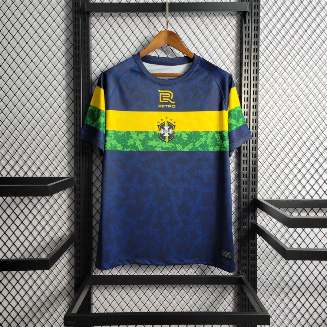Mens World Cup Brazil Blue Special Edition Jersey 2022 Mens World Cup Brazil Blue Special Edition Jersey 2022 on hanger showing navy body with yellow and green chest band