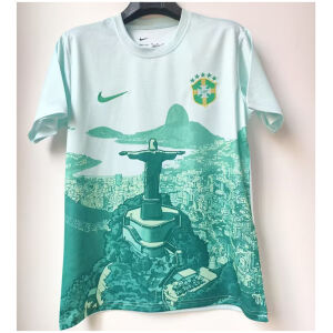 Mens Brazil Green White Jersey 2025 on hanger showing white-to-mint gradient and green Christ statue illustration
