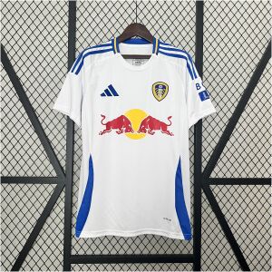 Mens Leeds United Home Jersey 2024/25 on hanger showing white body with royal blue shoulder stripes and Red Bull sponsor