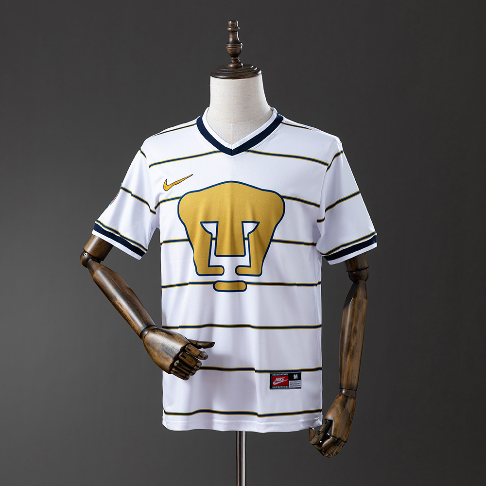 Mens Pumas unam Retro Away Jersey 1997/98 Mens Pumas unam Retro Away Jersey 1997/98 front view showing giant gold crest