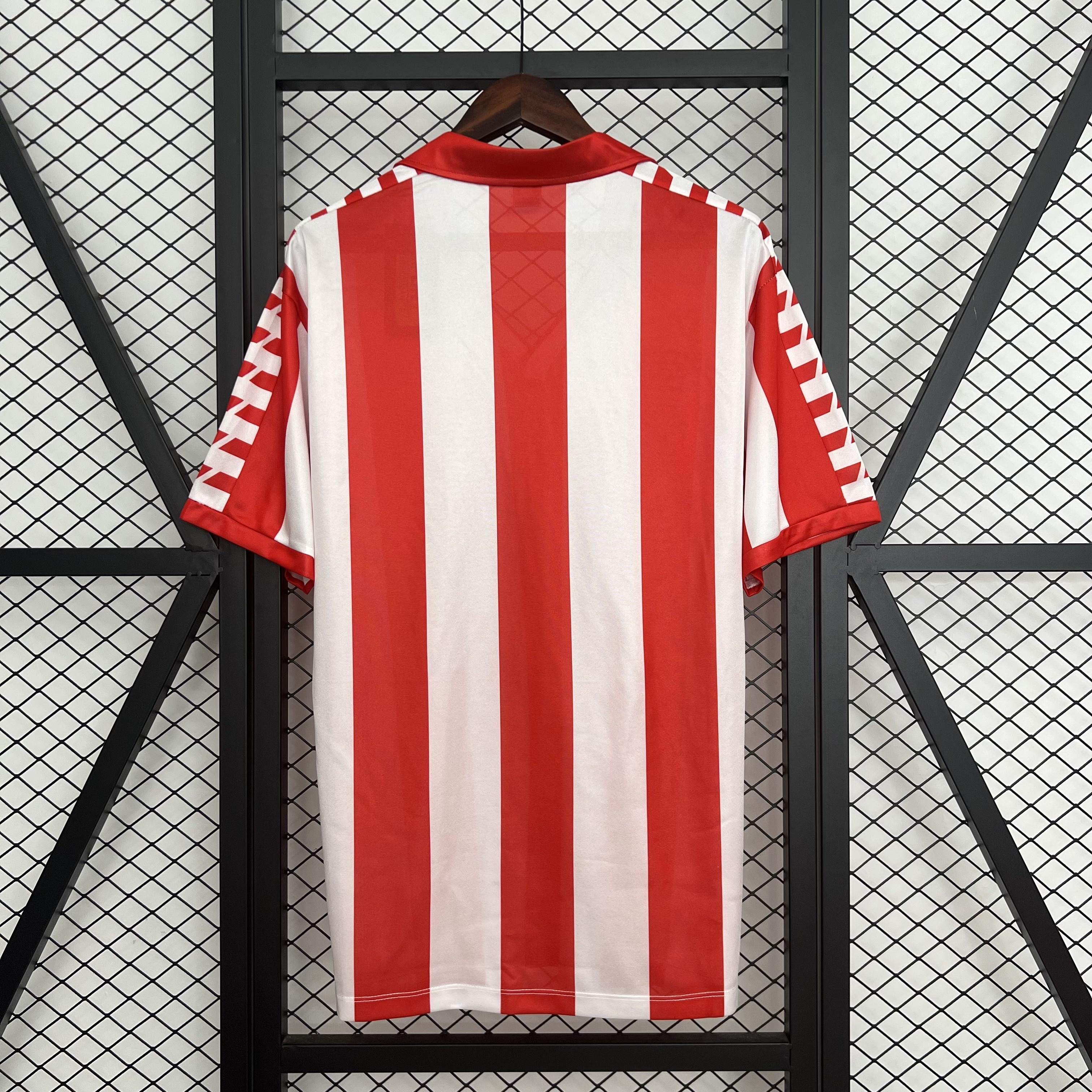 Mens Atletico Madrid Retro Home Jersey 1982/83 Mens Atletico Madrid Retro Home Jersey 1982/83 front view on display