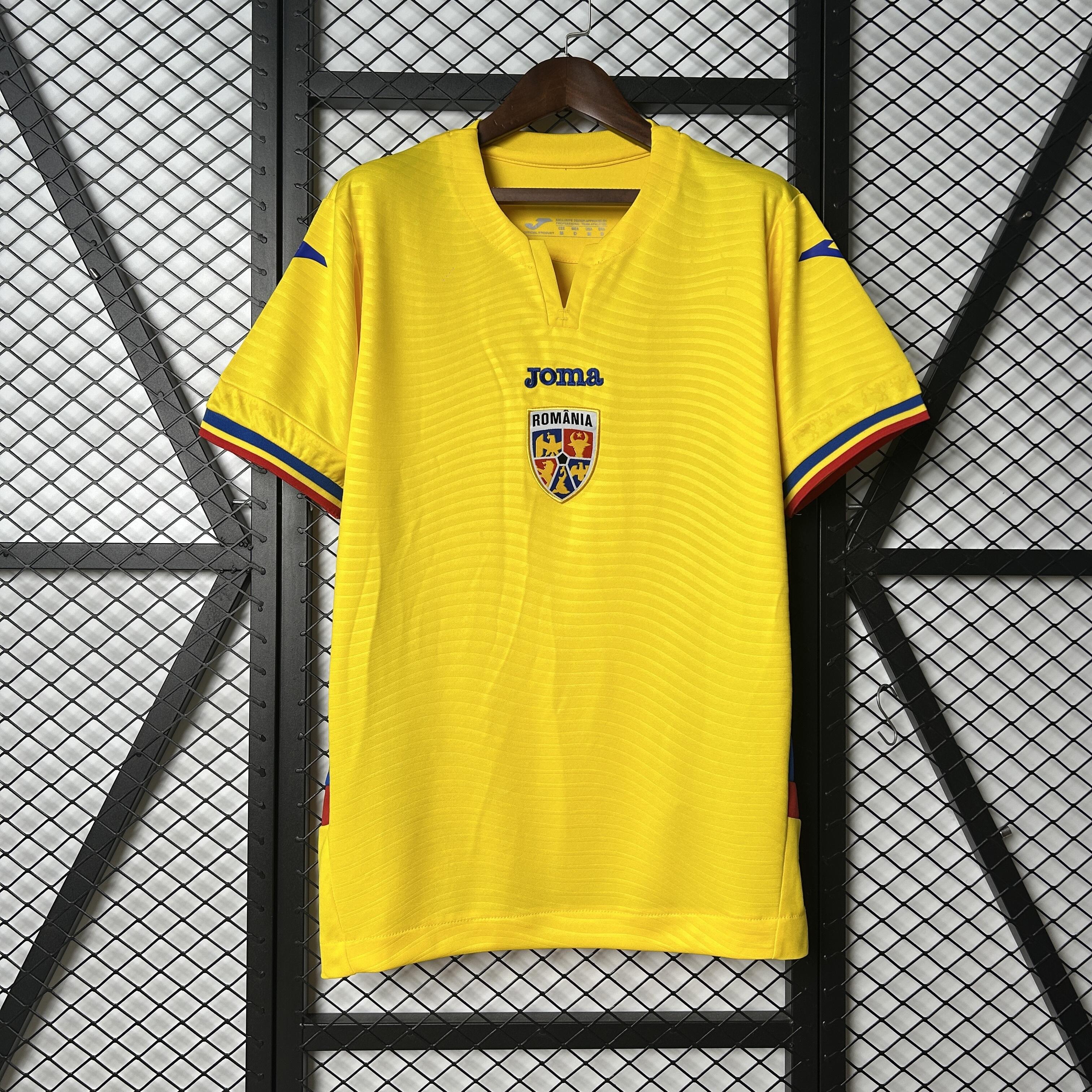 Mens Romania Home Jersey 2025 Mens Romania Home Jersey 2025 front view on hanger