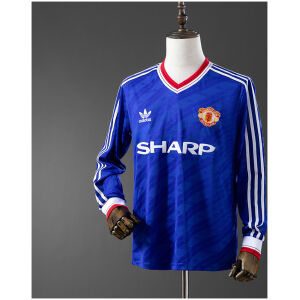 Mens Manchester United Second Retro Long Sleeve Away Jersey 1986/88 on mannequin showing royal blue body with shadow stripes