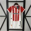 Kids Sporting Gijon Home Kit 2024/25 front view on display