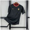 Mens Belgium Retro Away Jersey 2000 angled on hanger showing black foundation and yellow-red collar trim
