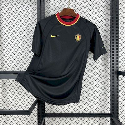 Mens Belgium Retro Away Jersey 2000 Mens Belgium Retro Away Jersey 2000 angled on hanger showing black foundation and yellow-red collar trim