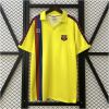 Yellow Barcelona retro away jersey with brick-red and navy stripes front view