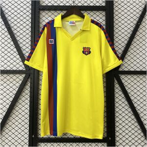Mens Barcelona Retro Away Jersey 1982/84 Yellow Barcelona retro away jersey with brick-red and navy stripes front view