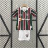 Kids Fluminense Home Kit 2024/25 front view on display