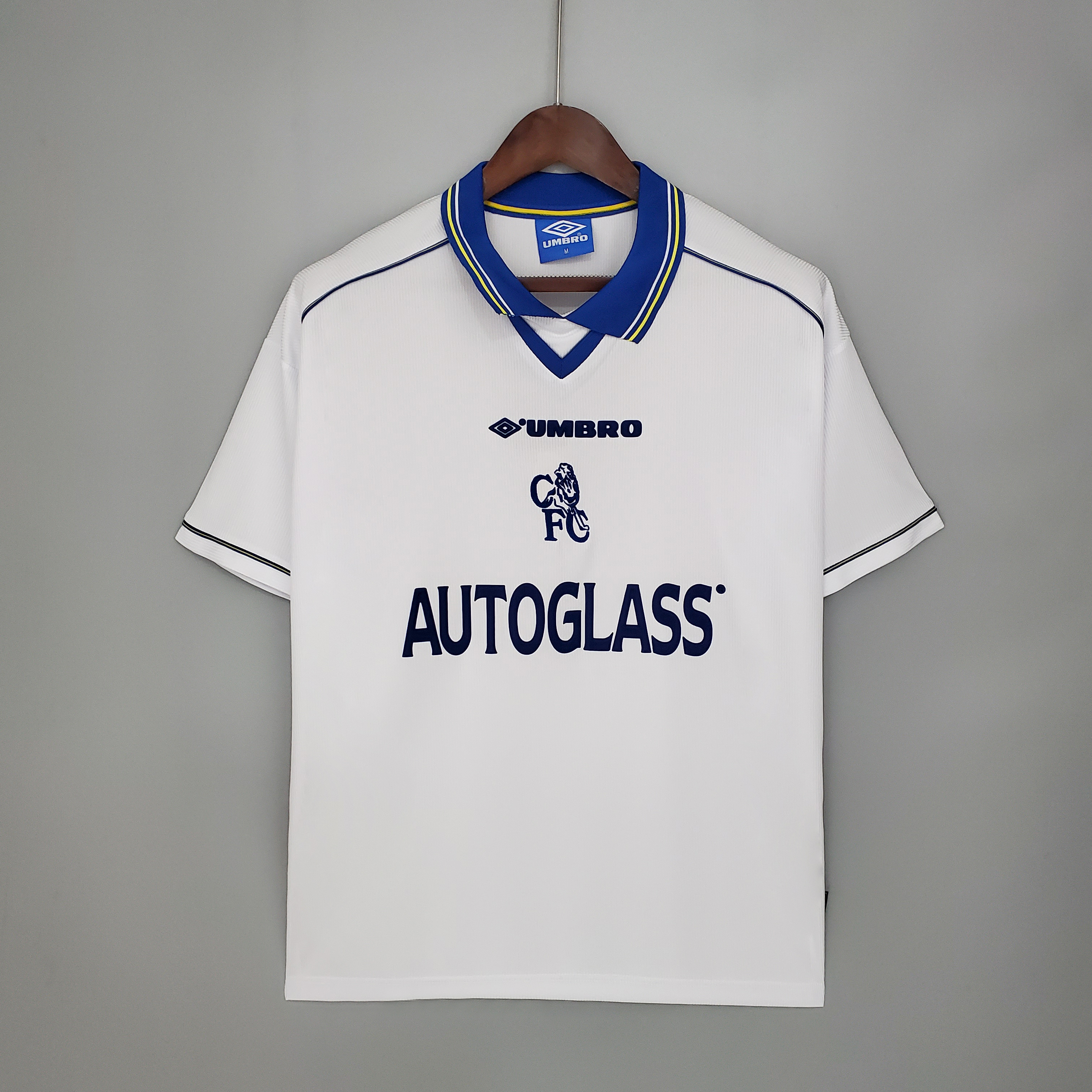 Mens Chelsea Retro Away Jersey 1998/00 Mens Chelsea Retro Away Jersey 1998/00 on hanger showing white jacquard body with tipped blue polo collar and AUTOGLASS sponsor