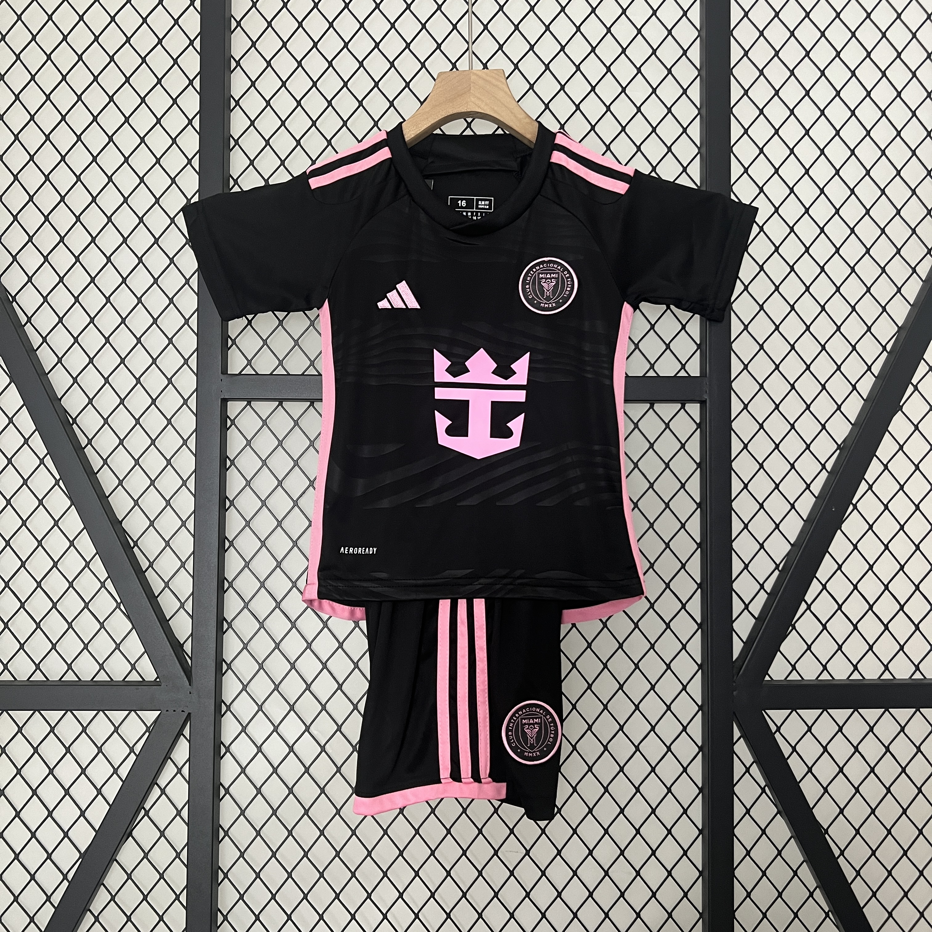 Kids Miami Away Kit 2024/25 Kids Miami Away Kit 2024/25 front view showing black shirt and shorts