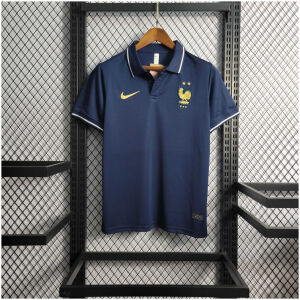 Mens World Cup France Sapphire Polo 2022 Mens World Cup France Sapphire Polo 2022 front view on hanger displaying white piping and gold rooster crest