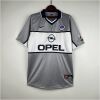 Mens PSG Retro Away Jersey 1999/00 on hanger displaying silver-grey body and white chest band with OPEL logo