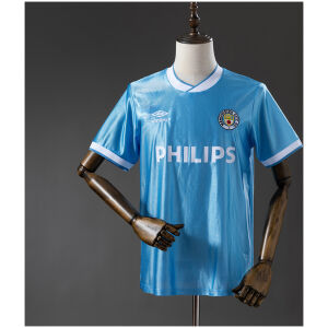 Mens Manchester City Retro Home Jersey 1986/87 on mannequin showing sky blue body with white V-neck and PHILIPS sponsor