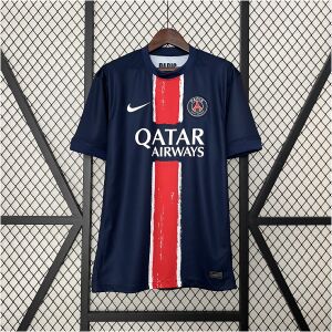 Mens PSG Home Jersey 2024/25 on hanger showing midnight navy body and painterly red brushstroke Hechter stripe
