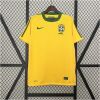 Mens World Cup Brazil yellow Retro Home Jersey 2010 on hanger showing canary yellow body with green collar