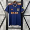 Mens Newcastle United game Third Jersey 2025/26 on hanger showing royal blue body with orange accents and sela