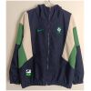 Mens Brazil Sapphire Windbreaker 2025 on hanger showing navy jacket with sand and green chevron blocks