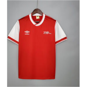 Mens Arsenal Retro Home Jersey 1983/86 on hanger showing red pinstriped body with white raglan sleeves and cannon badge