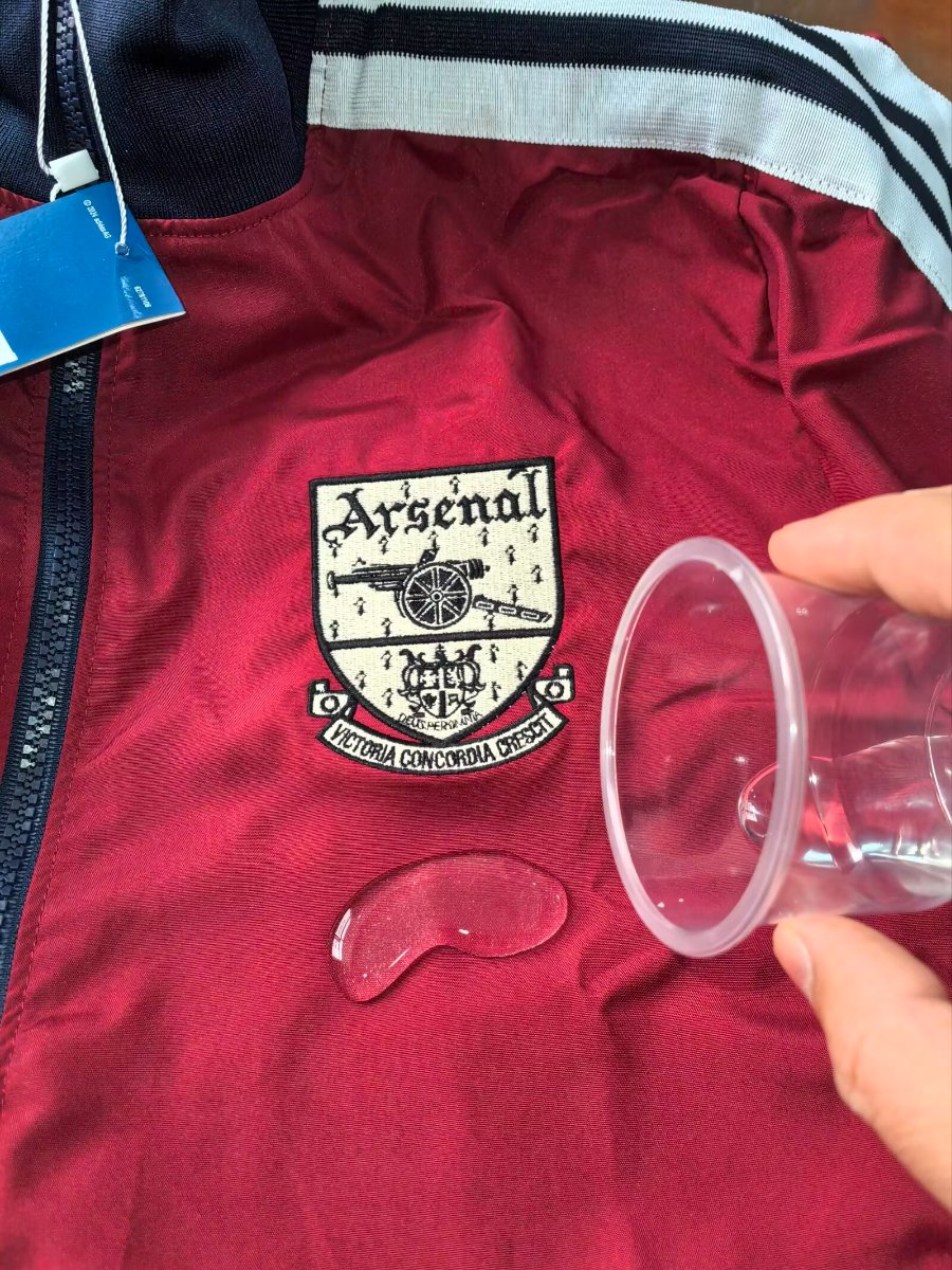 Mens Arsenal Windbreaker Jacket Burgundy Black 2026/27 Mens Arsenal Windbreaker Jacket Burgundy Black 2026/27