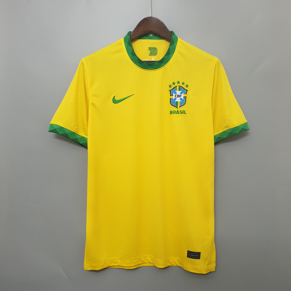 Mens Brazil yellow Retro Home Jersey 2020 Mens Brazil yellow Retro Home Jersey 2020 on hanger showing canary yellow body with diamond green collar