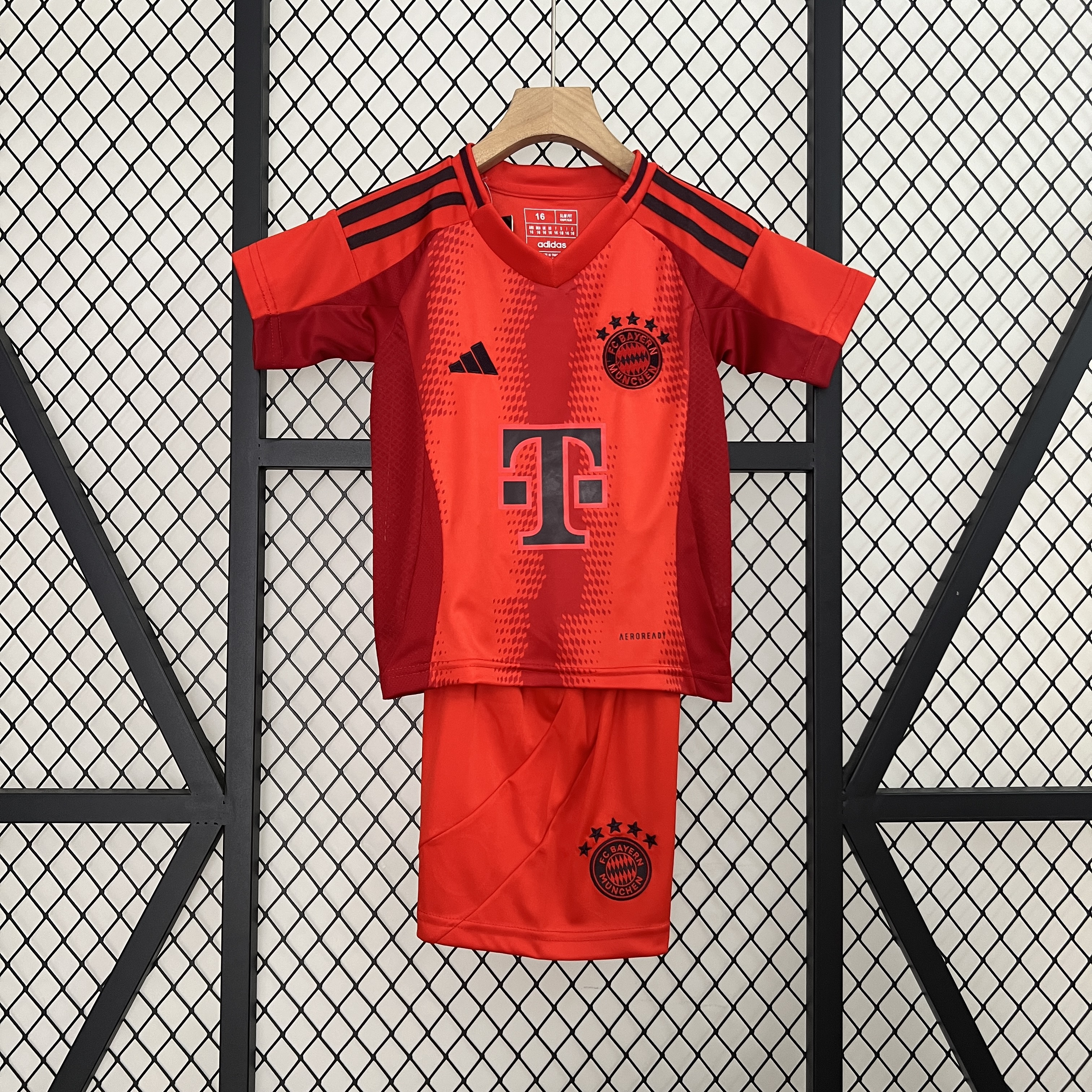Kids Bayern Munich Home Kit 2024/25 Kids Bayern Munich Home Kit 2024/25 front view on display