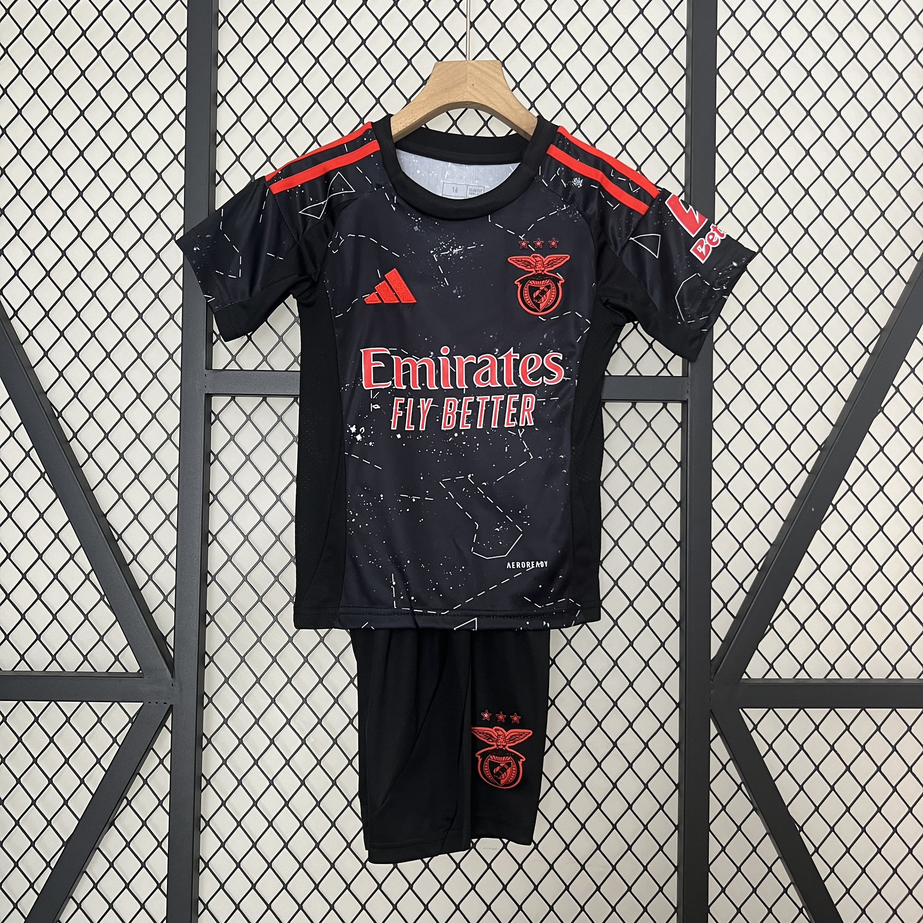 Kids Benfica Away Kit 2024/25 Kids Benfica Away Kit 2024/25 front view in black with constellation graphics