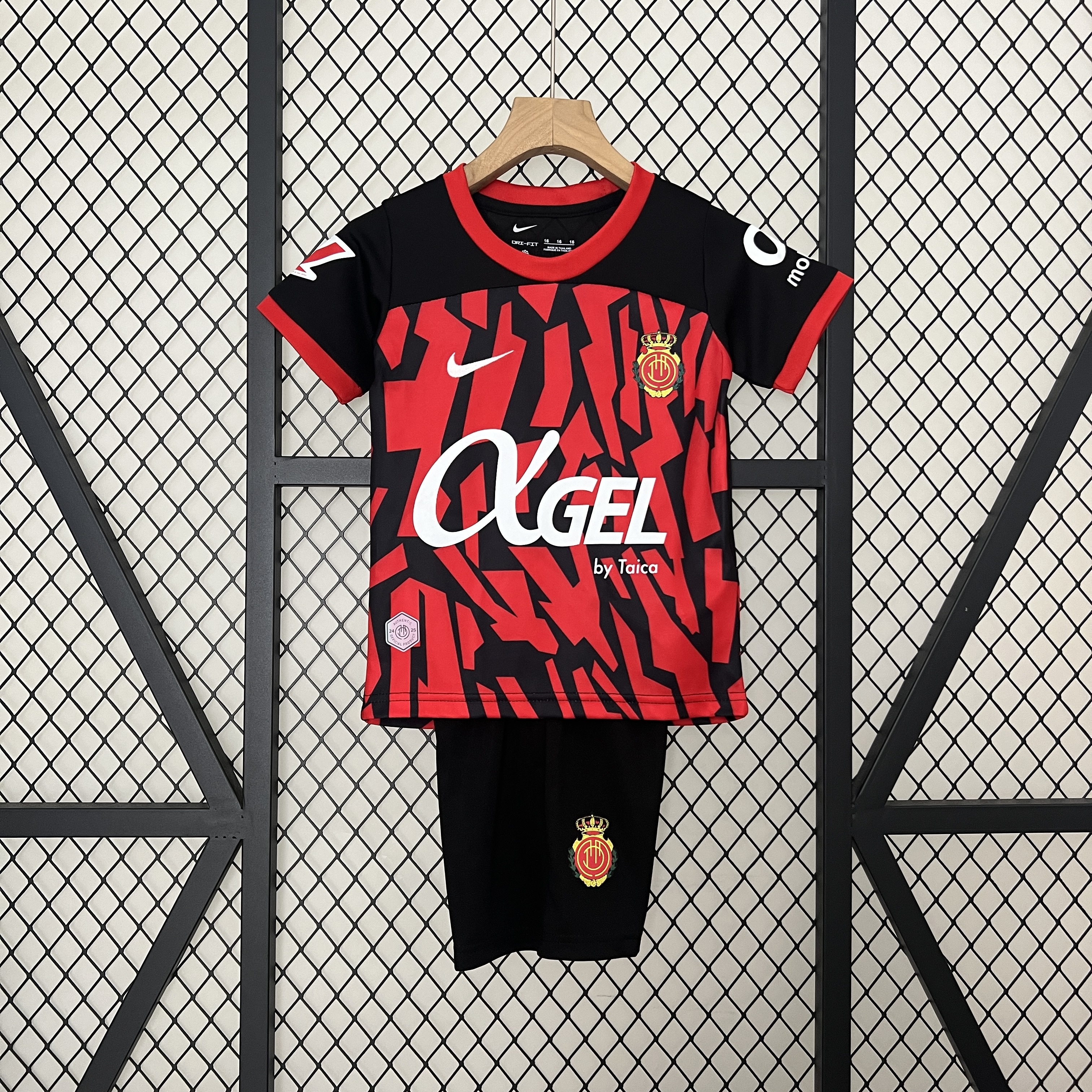 Kids Mallorca black Home Kit 2024/25 Kids Mallorca black Home Kit 2024/25 front view on display