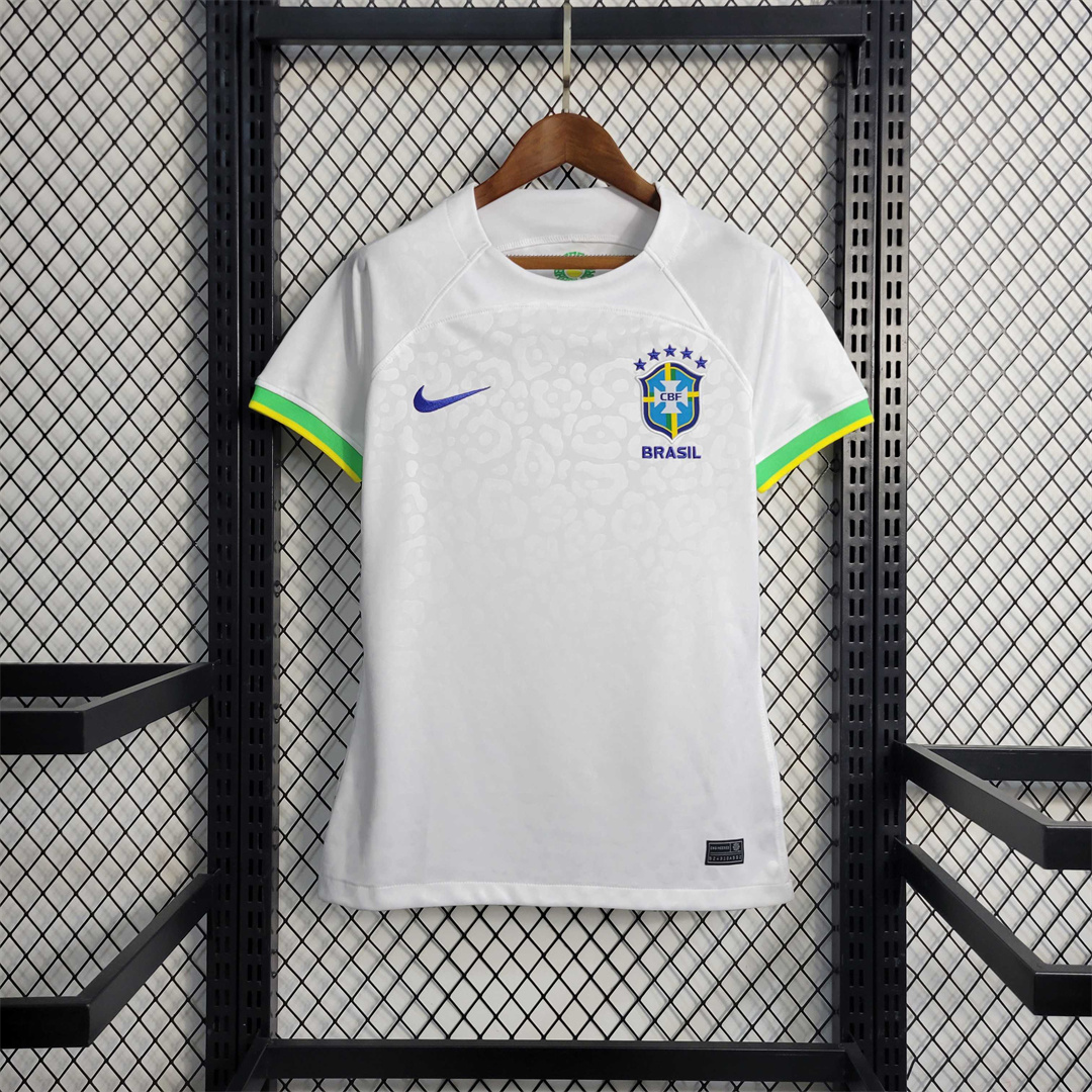 Womens World Cup Brazil White Leopard Jersey 2022 Womens World Cup Brazil White Leopard Jersey 2022 on hanger showing white body with yellow and green cuffs