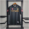 Mens Juventus Retro Away Jersey 2001/02 on hanger showing black and red panels with FASTWEB sponsor